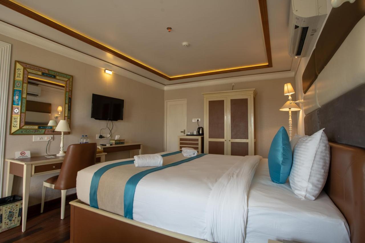 State Beach Resort And Spa 坎努尔 外观 照片