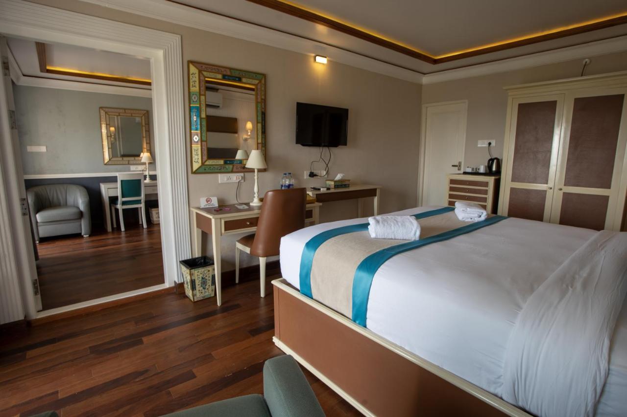 State Beach Resort And Spa 坎努尔 外观 照片