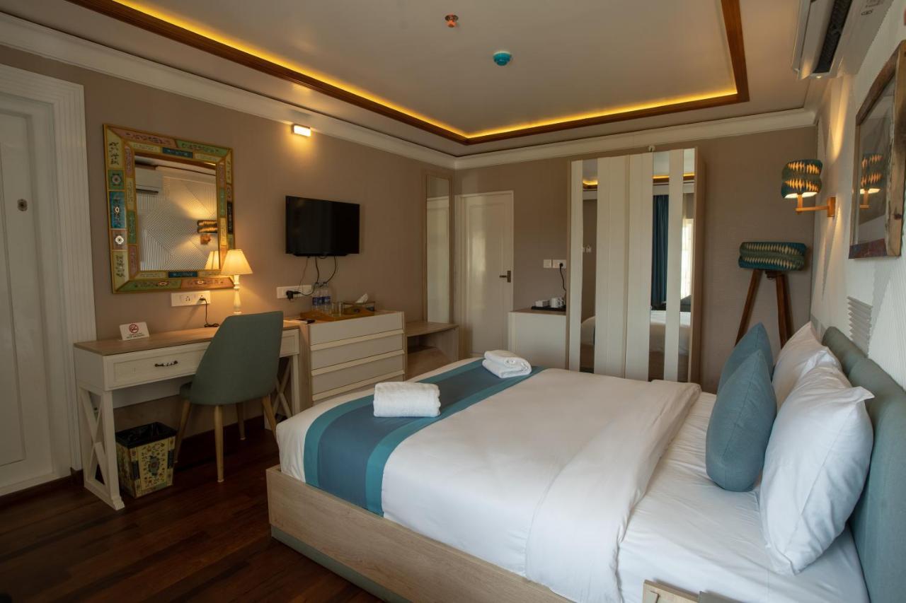 State Beach Resort And Spa 坎努尔 外观 照片