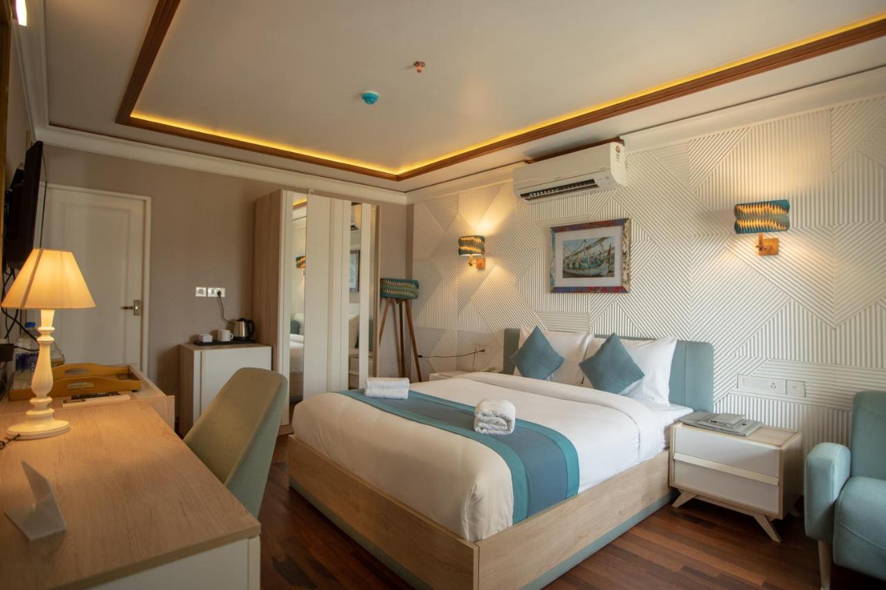 State Beach Resort And Spa 坎努尔 外观 照片