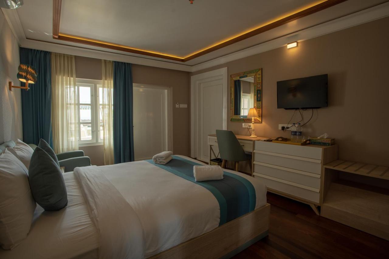 State Beach Resort And Spa 坎努尔 外观 照片