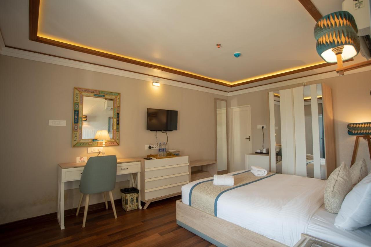 State Beach Resort And Spa 坎努尔 外观 照片